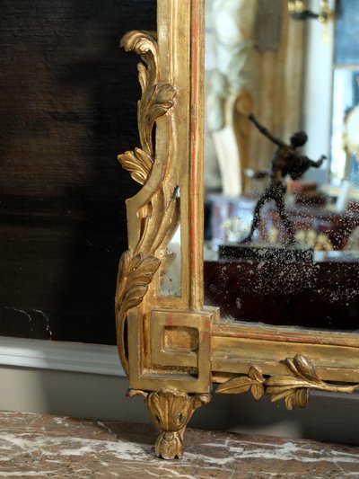 Louis XVI gilded wood mirror