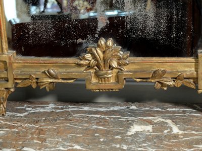 Louis XVI gilded wood mirror