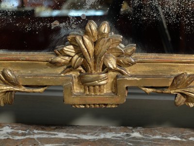 Louis XVI gilded wood mirror