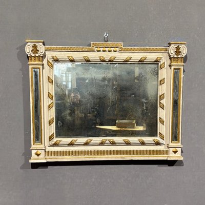 Miroir ancien laqué et doré