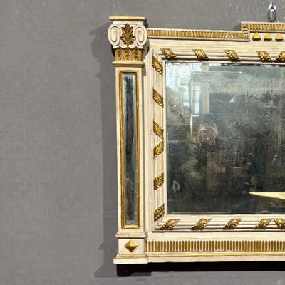 Miroir ancien laqué et doré