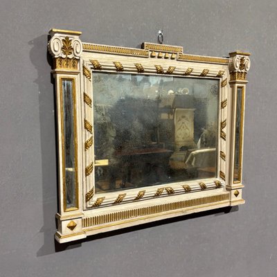 Miroir ancien laqué et doré