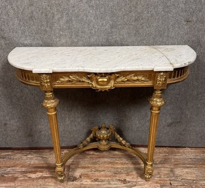 Louis XVI style half-moon console in gilded and carved wood circa 1850