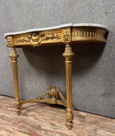 Louis XVI style half-moon console in gilded and carved wood circa 1850