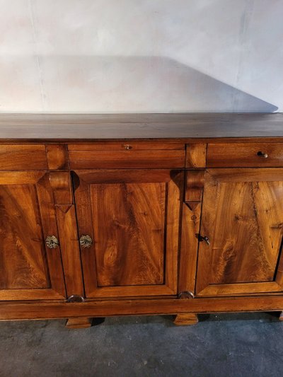 Restoration period sideboard in solid walnut.