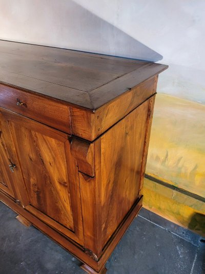 Restoration period sideboard in solid walnut.