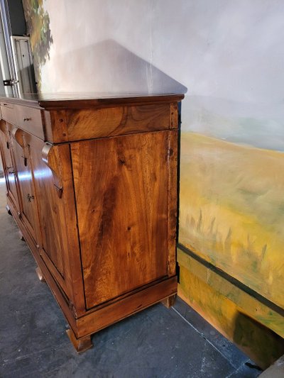 Restoration period sideboard in solid walnut.