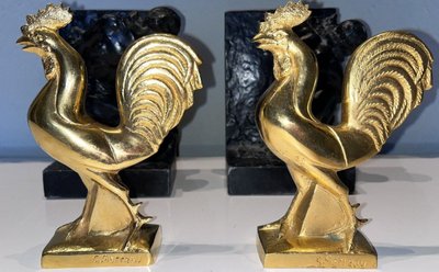Georges Raoul GARREAU (1885-1954) Coppia di reggilibri in bronzo dorato firmati