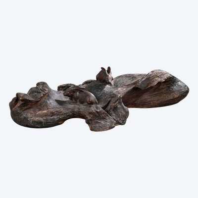 Okimono - Sculpture of rabbits walking in a landscape.