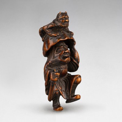 Netsuke in bosso raffigurante Shoki e Oni. Giappone 19 Edo