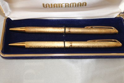 Waterman gold-plated ballpoint pens in box and Globus Judaica silver pen, 20th c.
