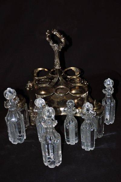 Crystal condiment set with silver frame