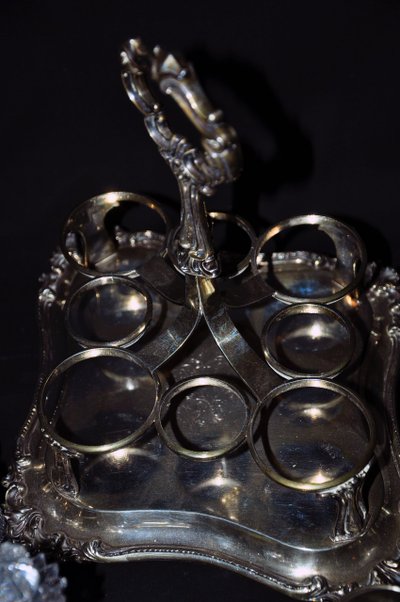 Crystal condiment set with silver frame
