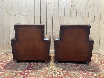 Paire de fauteuils Club en cuir usés 