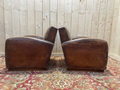 Paire de fauteuils Club en cuir usés 