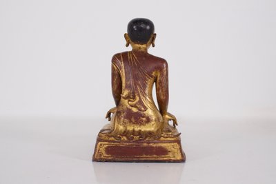 Burmese adoring monk in gilt bronze