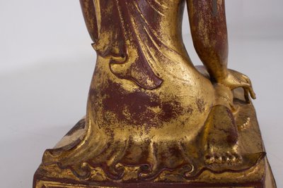 Burmese adoring monk in gilt bronze