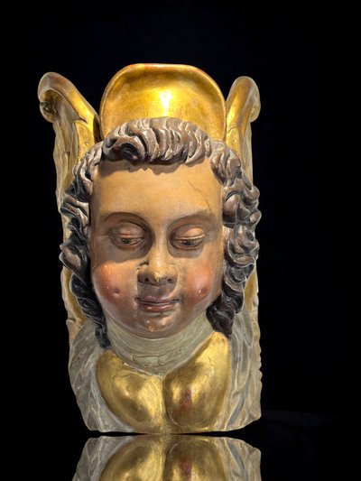 CONSOLE DA PARETE DEL XVII SECOLO CHE RAPPRESENTA UNA TESTA D'ANGELO IN LEGNO POLICROMATO