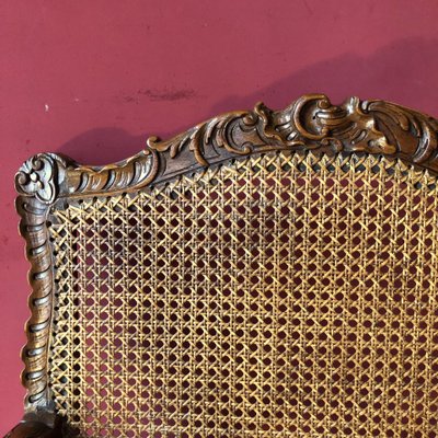 Fauteuil richement sculpté, époque Régence