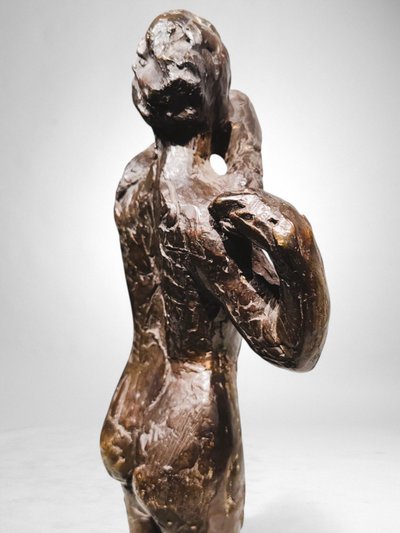 Dancer stapling the epaulette to her bodice - Edgar Degas, Valsuani cast, 1998