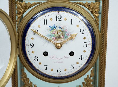 Antico orologio di Napoleone III in bronzo dorato e marmo. Francia, XIX secolo.