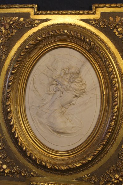 Pair of carved marble medallions with women's profiles in low relief by Louis Bottée expo 1889