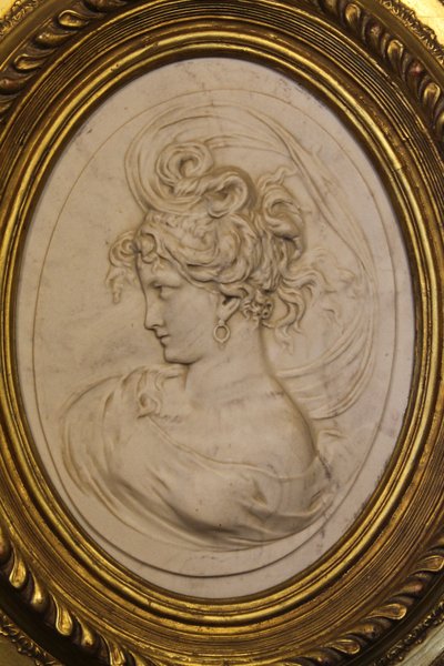 Pair of carved marble medallions with women's profiles in low relief by Louis Bottée expo 1889