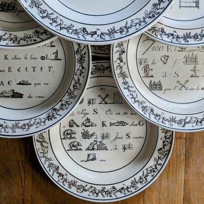 Montereau - suite of 12 plates - rebus décor circa 1820