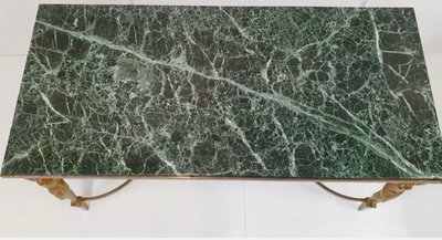 Maison JANSEN Table basse en bronze et laiton doré, cariatides et marbre