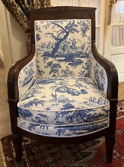 Very fine pair of mahogany and mahogany veneered bergères from the Empire period circa 1810