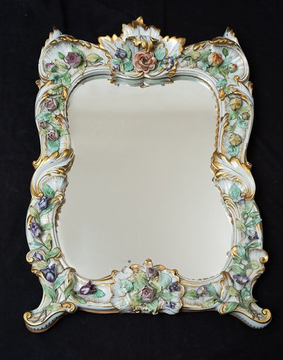 Antique polychrome porcelain mirror from Capodimonte, early 20th century.