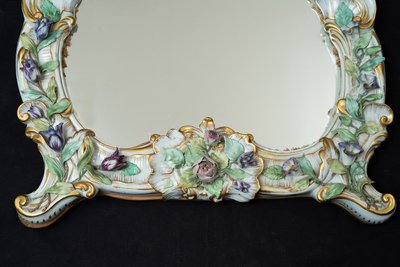 Antique polychrome porcelain mirror from Capodimonte, early 20th century.