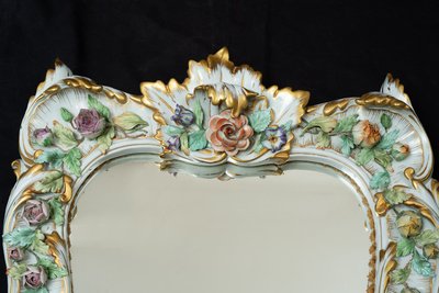 Antique polychrome porcelain mirror from Capodimonte, early 20th century.