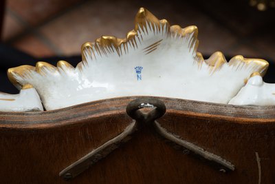 Antique polychrome porcelain mirror from Capodimonte, early 20th century.