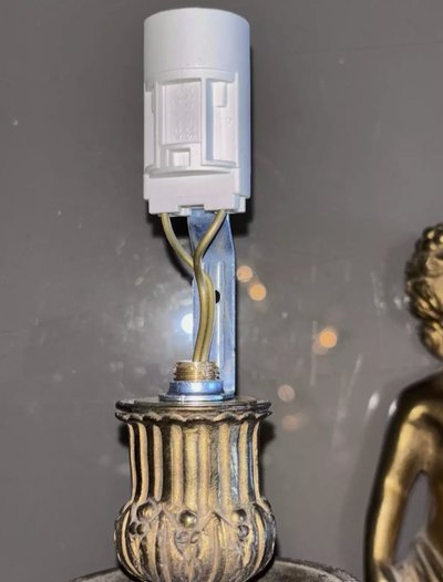 Coppia di appliques in ormolu del XIX secolo, decorate con putti