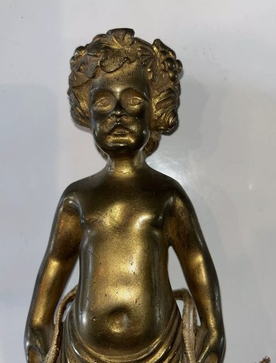 Coppia di appliques in ormolu del XIX secolo, decorate con putti