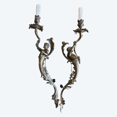 Grandes appliques XIXème en bronze doré ciselé, a décor de faunes/satyres H Total 60cm
