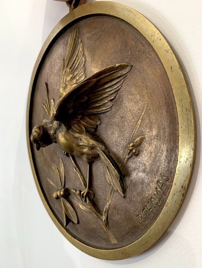 Médaillon en bronze signé Paul Thomas