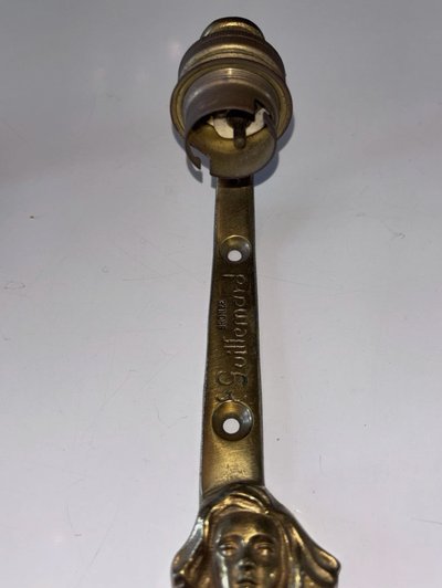 E. Guillemard (1918-1944) Two Art Deco gilded bronze wall lights Signed