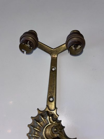 E. Guillemard (1918-1944) Two Art Deco gilded bronze wall lights Signed