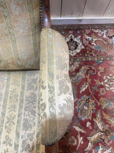 Fauteuil anglais en acajou à oreilles 