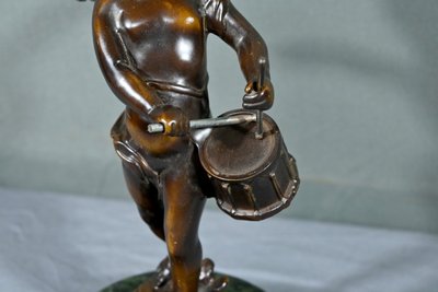 Putto in bronzo con tamburello, firmato A.Moreau – fine XIX secolo