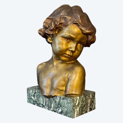 J.-M. CAMUS Large bust of a child in gilded and patinated bronze.