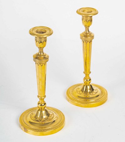 Pair of French Directoire Period Chiseled Gilt Bronze Candlesticks, Circa 1795-1799