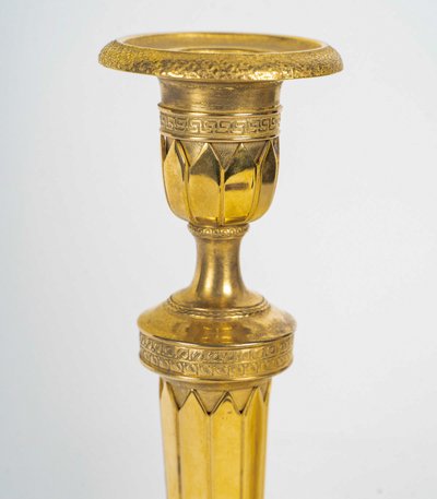 Pair of French Directoire Period Chiseled Gilt Bronze Candlesticks, Circa 1795-1799