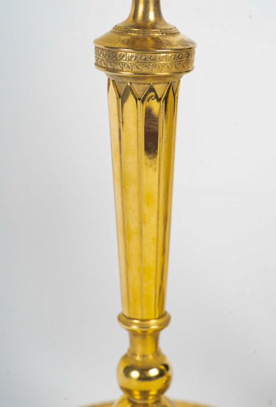 Pair of French Directoire Period Chiseled Gilt Bronze Candlesticks, Circa 1795-1799