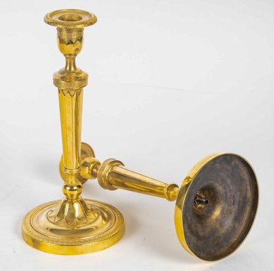 Pair of French Directoire Period Chiseled Gilt Bronze Candlesticks, Circa 1795-1799