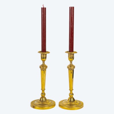 Pair of French Directoire Period Chiseled Gilt Bronze Candlesticks, Circa 1795-1799