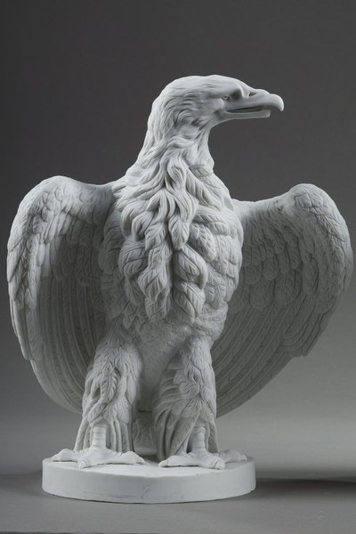 PAIR BISCUIT SCULPTURES OF NAPOLEON III EAGLES