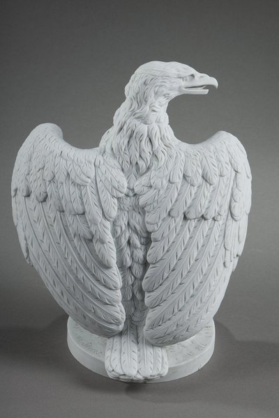 PAIR BISCUIT SCULPTURES OF NAPOLEON III EAGLES